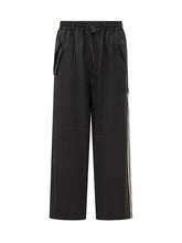 Pantaloni larghi neri con bande laterali Y-3 - Fall/Winter 25 | $store$