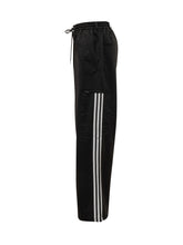 Pantaloni larghi neri con bande laterali Y-3 - Fall/Winter 25 | $store$